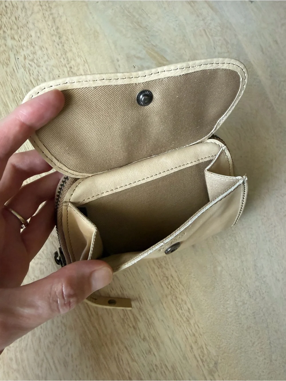 Fossil brand light Beige Patchwork Leather zip around Wallet with Button detail